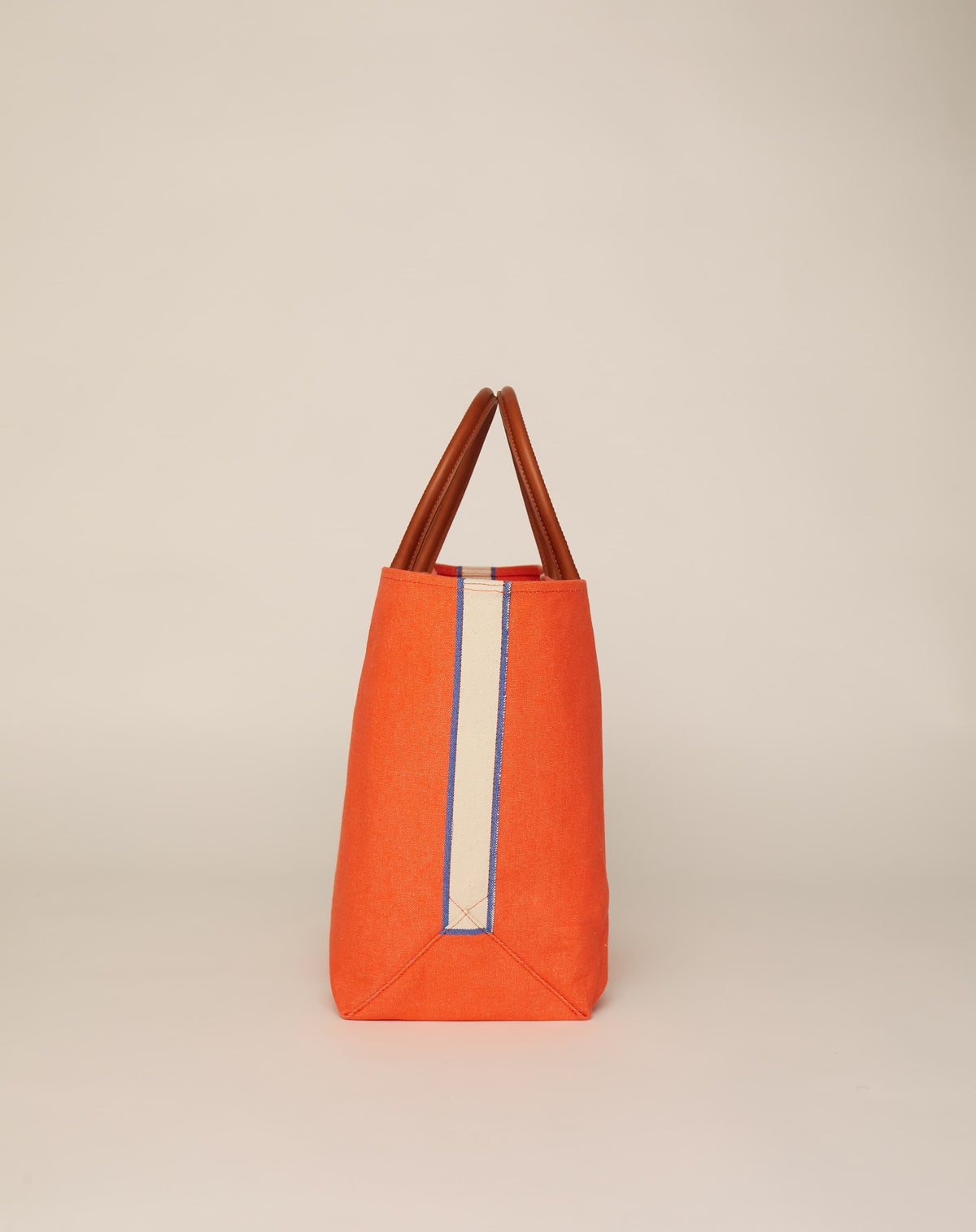Profile image of classic canvas tote bag in bright orange colour with tan leather handles and contrasting natural ecru stripes.